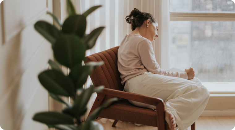 A person in quiet reflection at home
